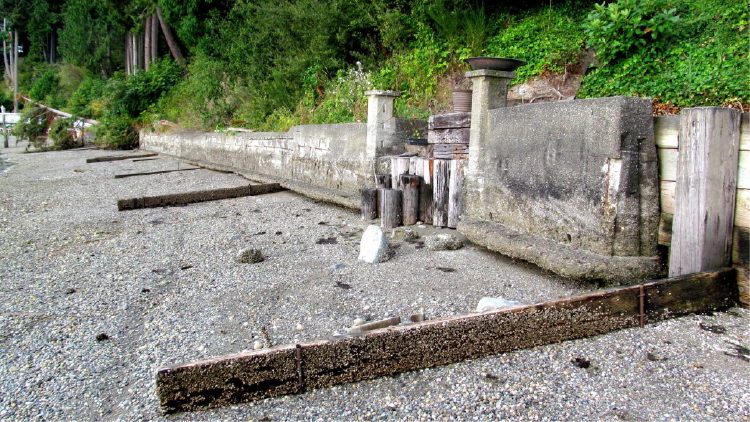 Old concrete and wood bulkhead on a Washington shoreline